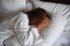 woman-in-bed-covering-head-in-morning-2024-10-17-06-37-00-utc