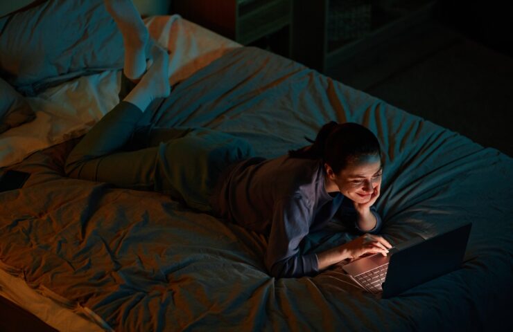 young-woman-watching-movies-at-night-2025-03-09-00-20-30-utc